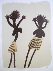 Women dancing in grass skirts